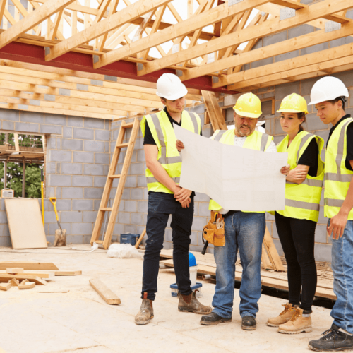 builders discussing over map